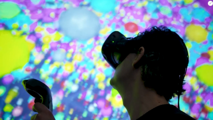 Researcher using VR headset for 3D tumour mapping