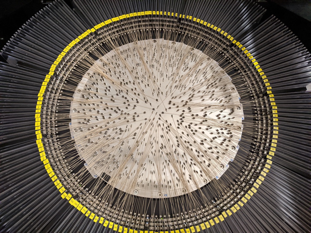 A fully-configured WEAVE field positioner plate